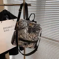 Retro canvas backpack with black and white animal palm print and leather trim - Printed Black