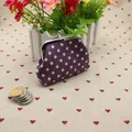 Retro purple cotton coin purse with white polka dots and silver metal kiss-lock closure - Purple