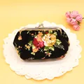 Vintage floral canvas coin purse in black with colorful flower patterns and metal clasp - Black