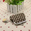 Vintage brown polka dot coin purse with silver metal clasp in durable canvas material - Brown