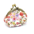 Detailed macro of vintage floral fabric and bronze clasp on a Japanese style coin purse - White Mixed Japanese Style / White