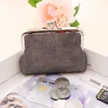 Dettaglio del mini portamonete vintage glitter argento con chiusura a scatto in metallo - 4 Pollici / Grigio