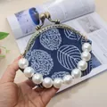 Detail of leaf embroidery on blue canvas with vintage metal frame and pearl handle - Bead Chain Included / 10.5cm Kiss-lock / Blue