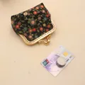 Vintage floral coin purse with metal clasp and credit card for size comparison - Black