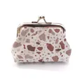 Detail of a vintage kiss-lock coin purse with stone pattern and glitter accents - Beige / 3 Inch
