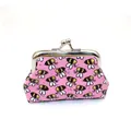 Detail of pink PU laser bee coin purse with a vintage silver metal kiss lock closure - Pink
