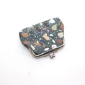 Detailed view of vintage kiss-lock coin purse with abstract stone pattern and silver metal clasp - Olive Green / 3 Inch