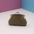 Army green canvas coin purse with silver metal clasp closure on a colorful backdrop - Gray