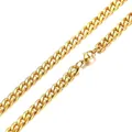 Macro shot of 18k gold plated stainless steel Cuban link chain with lobster clasp - 9.5mm Width / 23cm Length (Bracelet) / Gold