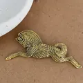 Vintage golden horse brooch with detailed embossed texture and a minimalist running posture - Gold