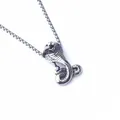 Detailed view of carved cobra snake pendant with stainless steel box chain link - Small Cobra Style