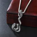 Vintage stainless steel snake pendant necklace with detailed scales on a dark wood box - Snake With Steel Chain