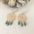 Detail of woven rattan earrings with white studs and green faceted crystal beads - Opal-look Green Bead Style 5