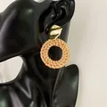 Bohemian rattan hoop earrings with gold geometric metal studs worn on a model - Dark Color Rattan Style (B03)