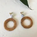Handmade bohemian rattan hoop earrings with marbled resin beads on white stone background - New Rattan Woven 60 (Marble Texture Top Large Ring)