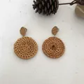 Close-up of handmade woven rattan drop earrings featuring natural round geometric details - New Woven Rattan Round Disc Drop Earrings 70