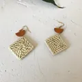 Detailed close-up of handmade square raffia woven earrings with wood accents and gold hooks - New Rattan Woven 55 (Brown Wood Top Square Weave)