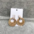 Bohemian rattan and cream marble acrylic drop earrings on a white display card - Dark Rattan Cream White