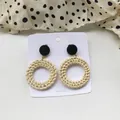 Handmade rattan hoop earrings with black resin studs for a boho beach vacation look - New Rattan Woven 10 (Black Dome Large Hoop)