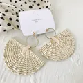 Handmade woven rattan fan earrings with gold accents on minimalist white display card - Light Color Fan Rattan Style (A27)