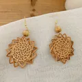 Bohemian geometric rattan woven earrings with wood bead and golden hooks on white fabric - Wood Bead Hook Rattan Style (B36)
