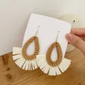 Close-up of bohemian water-drop woven raffia fringe earrings with brown straw detail - Dark Color Water Drop Rattan (A88)