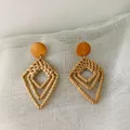 Handmade bohemian rattan earrings with geometric wooden studs and woven diamond charms - Dark Rhombus