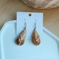 Macro detail of drop-shaped straw woven earrings on a display card with golden hooks - Natural Waterdrop Style (A11)
