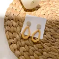 Vintage geometric wooden drop earrings in yellow finish on white jewelry display card - Yellow Style