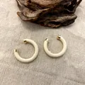 Minimalist cream wooden C-shaped hoop earrings with gold accents on rustic linen background - 3.5cm Diameter / Off White