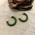 Retro dark green C-shaped wooden hoop earrings with gold metal ends on linen background - 3.5cm Diameter / Green