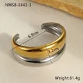 Detail view of two-tone gold and silver irregular hammered stainless steel cuff bracelet - Gold Silver Two-tone Spliced Style (NMSB-E442-3)