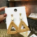 Handmade woven rattan geometric triangle earrings with white beads and golden studs - Deep Color Triangle Rattan