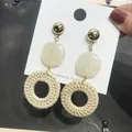 Handmade woven rattan earrings with ivory resin and gold geometric circle pendant - New Rattan Woven 75 (Cream White Resin Ring)