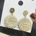 Bohemian woven rattan drop earrings with golden round textured studs and cream tassels - New Rattan Woven 77 (Gold Top Cream Ring)