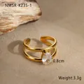 Detailansicht eines 18K vergoldeten Doppelrings mit einem 0,8 cm ovalen Zirkonia Stein - Ovaler Zirkonia Stil (NMSR-K235-1)