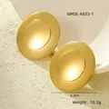 Macro view of gold two-tone geometric disc earrings with 3.3cm diameter measurement - Brushed Texture Concentric Style (NMSE-A833-1) / 18K Gold