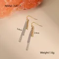 Macro detail of two-tone gold and silver chain tassel earrings showing 5cm length - 18K Gold / Mixed Color Tassel Earrings (NMSE-J547-1)