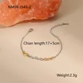 Detail view of dual-tone gold and silver chain bracelet with 17+5cm length and 2.3g weight - 18K Gold / Mixed Color Ring Thin Bracelet (NMSB-J548-2)
