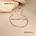 Detail of two-tone gold and silver stainless steel curb chain bracelet with lobster clasp - 18K Gold / Mixed Color Thin Link Bracelet (NMSB-J5410-2)