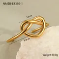 Detail shot of a minimalist gold knotted steel bangle with 6.9cm diameter and 30g weight - Rope Knot Style (NMSB-E4310-1) / 18K Gold