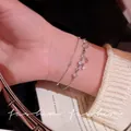 Elegant silver double-layered bracelet with tiny stars and sparkling zircon stones - Zirconia Star Bracelet