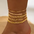 Five-piece gold layered anklet set featuring cross OT buckle and rhinestone eye charms - Gold Mixed Style Chain (29129-G)