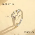 Macro detail of silver adjustable heart hands ring with size and weight measurements - One Size / Small (NMSR-H719-2) / Steel