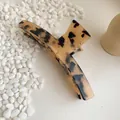 Large tortoiseshell acetate hair claw clip for women in a minimalist elegant style - Light Leopard