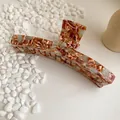Large tortoiseshell marble acetate hair claw clip shown with natural stones - Marble Pattern
