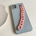 Blue aesthetic phone case with a bold pink chunky chain strap and silver rivets - Pink