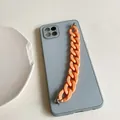 Blue silicone phone case with contrast orange matte chain and silver hardware rings - Orange