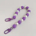 Detailed shot of purple and pearl white beaded phone strap with metal spring buckles - Purple Mixed Color Phone Chain