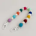 Colorful resin bead and pearl phone strap with metal lobster clasps on white background - Rainbow Phone Chain